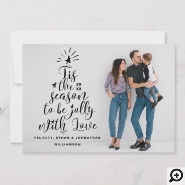 Celebrate the magical and festive holiday season with our custom holiday photo cards. Our modern holiday design features our holiday Christmas tree graphic designed with a festive and stylish script handwriting typography "Tis The Season To Be Jolly, With Love" in black that creates the impression and design of a Christmas tree. A star is placed at the top of the tree with lines to represent the star shinning brightly. The year, family member's names and last name are beautifully incorporated into the holiday tree design to create the tree shape. Large full print placeholder image with the black tree typography creates a modern and minimalistic holiday card design. The reverse side features a modern and trendy black and white watercolor stripe with family initial monogram. All artwork contained in this typography Christmas tree photo holiday card are hand-drawn original artwork by Moodthology. You can customize the text size, text colour, font and layout for your own personal design preference.