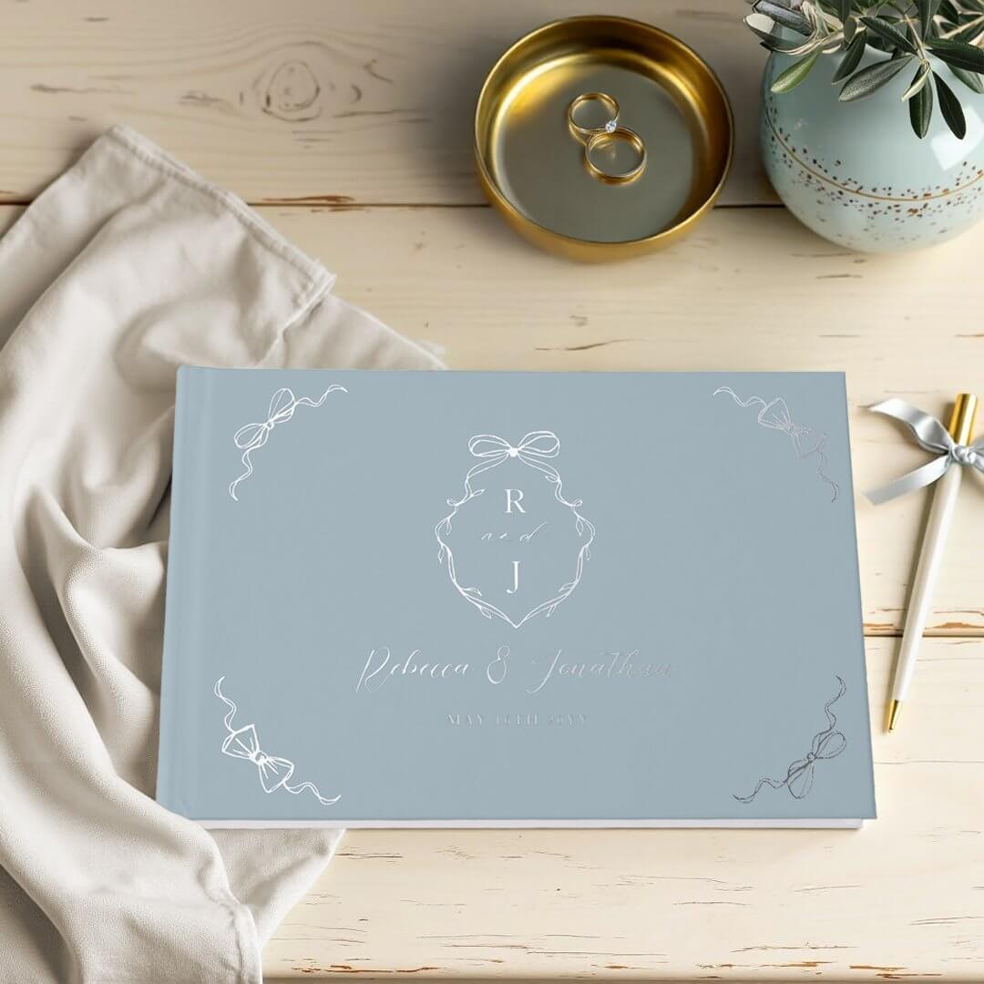 Elegant Hand Drawn Blue Bow & Ribbon Monogram Wedding Foil Guest Book