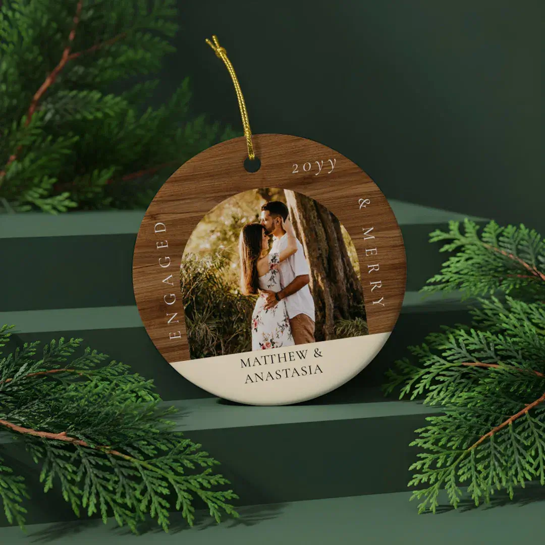 https://www.zazzle.com/minimal_modern_engaged_merry_2_photo_engagement_ceramic_ornament-256947709893649630