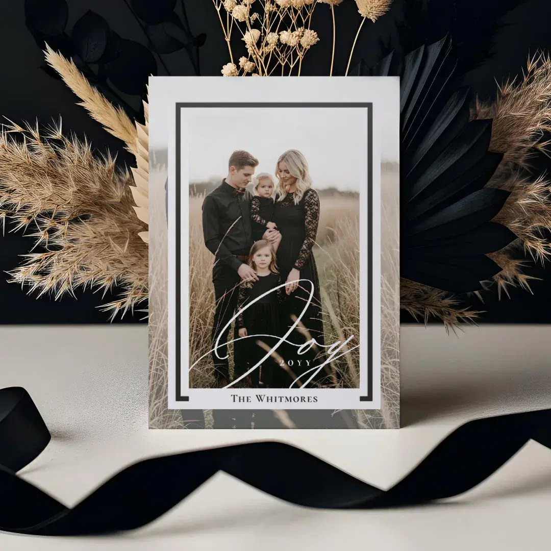 Share the joy of the season with this elegant and minimal holiday Christmas photo letterpress card design. Featuring a full-photo layout, your chosen image takes center stage—framed by a sleek letterpress border for a sophisticated touch. The edges of your photo are softly blended with a transparent effect, adding an airy, refined look that enhances the overall aesthetic. Across the image, the word "joy" is beautifully displayed in a modern, handwritten script, adding warmth and a personal feel. Customize the card with your family name and the year, along with a personalized message on the back for a truly personal holiday greeting. Perfect for sending to friends, family, or even as a stylish business holiday card, this timeless design combines luxury and simplicity in one stunning keepsake. Design by Moodthology Papery